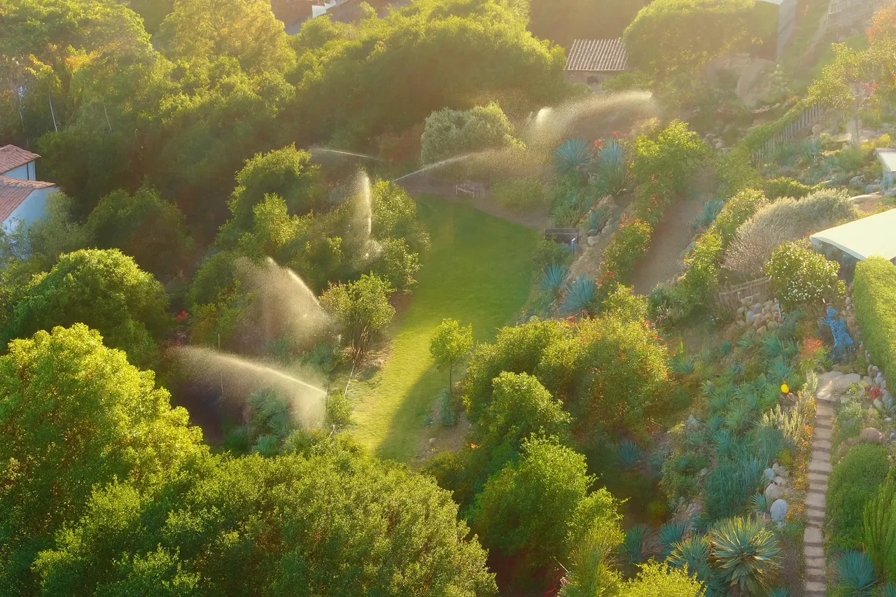 Close-up view of CitroSafe perimeter sprinkler system installation.